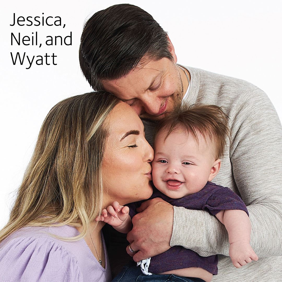 parents holding their baby